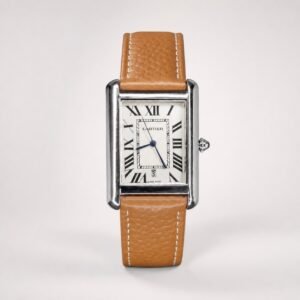 Rectangular silver-tone watch with white dial, black Roman numerals, blue hands, date window, and tan leather strap with white stitching.