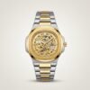 Two-tone stainless steel skeleton watch with gold bezel, silver bracelet, and exposed automatic movement.