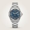Silver-tone diver style quartz watch with blue textured dial, luminous markers, silver rotating bezel, and stainless steel bracelet.