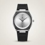 UP Universe Point watch with a sunburst dial, frosted silver bezel, and integrated black rubber strap.