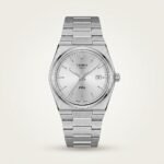 Silver-tone retro style watch with clean silver sunburst dial, silver indices, and integrated steel bracelet.