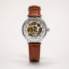 Fitron automatic skeleton watch with silver case, exposed gears, and brown leather strap.