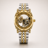ROVITE automatic skeleton watch with carved two-tone case, Roman numerals, and silver and gold link bracelet.