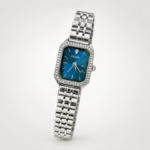 Olivia ladies watch with blue dial, crystal-set rectangular bezel, and silver stainless steel bracelet.