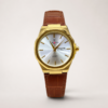 Trove watch with gold case, silver dial, day-date window, and brown leather strap.