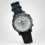 Men's sport watch with silver skeleton dial, black case, and black leather strap