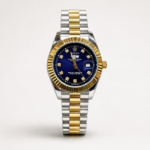 Two-tone silver and gold luxury style watch with blue sunburst dial, crystal markers, gold fluted bezel, and jubilee bracelet.