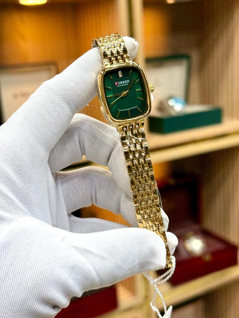 CURREN Blanche women's gold-tone watch with green rectangular dial and stainless steel bracelet.