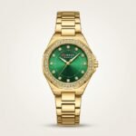 CURREN 9100 women's gold-tone watch with green sunburst dial, crystal markers, and rhinestone bezel.
