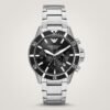Original diver style chronograph watch with black dial, luminous markers, black bezel, and stainless steel bracelet.