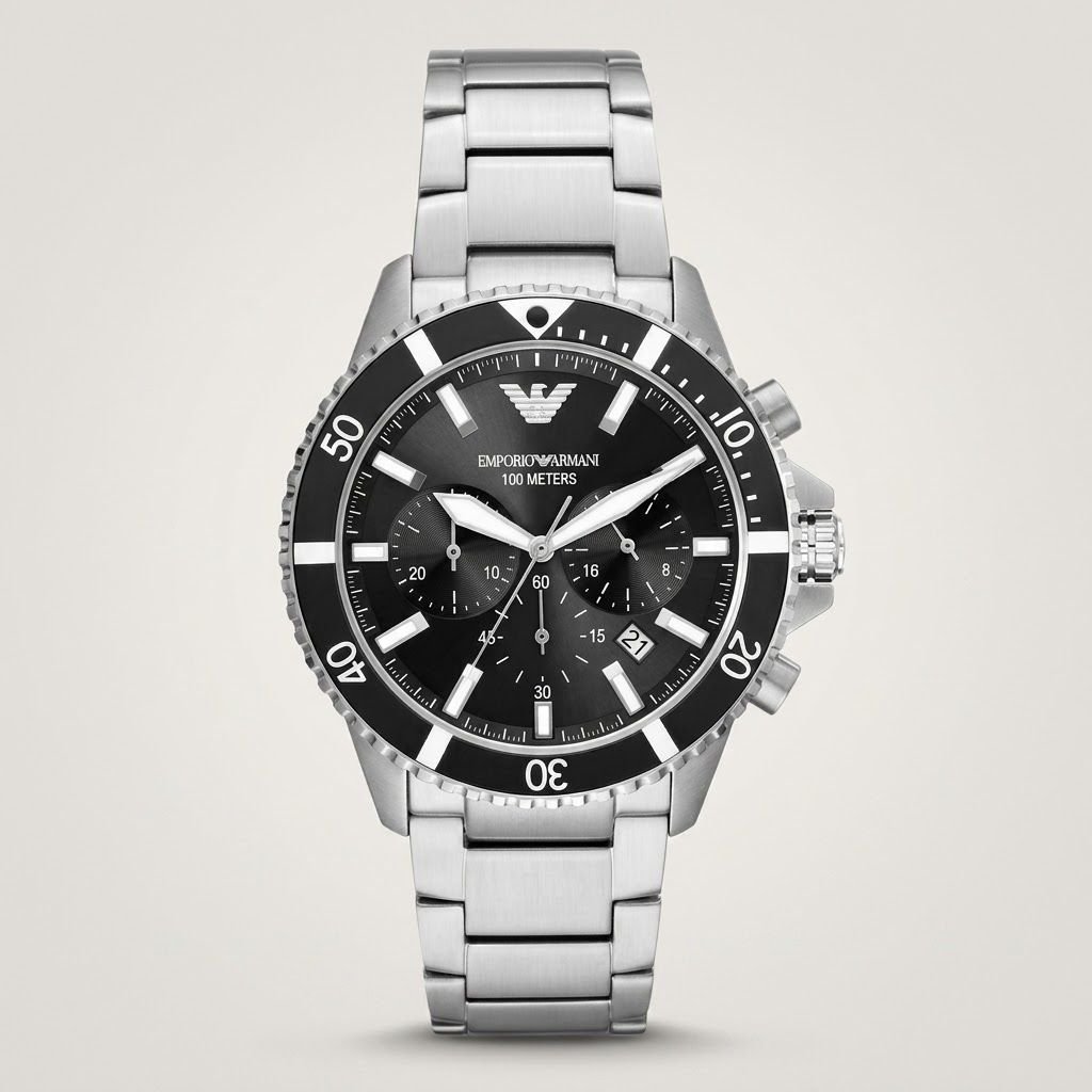 Original diver style chronograph watch with black dial, luminous markers, black bezel, and stainless steel bracelet.