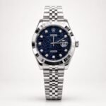 Silver luxury style watch with blue mosaic textured dial, crystal markers, fluted bezel, and jubilee bracelet.