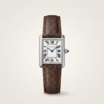 Silver rectangular dress watch with white dial, black Roman numerals, blued-steel hands, and brown leather strap.