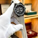 CURREN 8489 chronograph watch with black textured dial, silver markers, and grey silicone strap