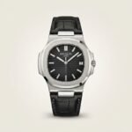 Patex classic watch with black dial, silver indices, and black leather strap.