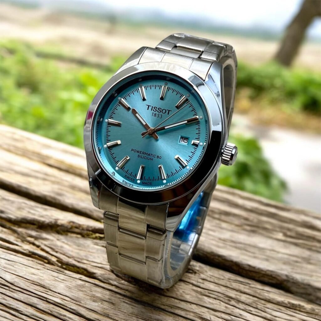 Gentleman style quartz watch with an ice blue sunburst dial and stainless steel bracelet.