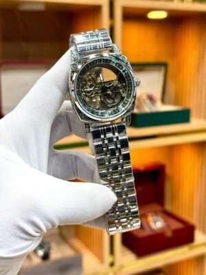 ROVITE Automatic Skeleton Watch – Carved Silver Case & Steel Bracelet Hover Image