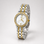 IEKE ladies luxury watch with mother of pearl dial, gold crystal bezel, and two-tone steel bracelet.