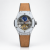 Automatic skeleton watch with tourbillon style cage, silver screw-down case, and tan suede strap