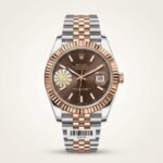 Premium two-tone automatic watch with chocolate dial, rose gold fluted bezel, and two-tone jubilee bracelet.