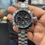 SKMEI 1515 analog-digital watch with silver stainless steel bracelet, tachymeter bezel, and chronograph functions.