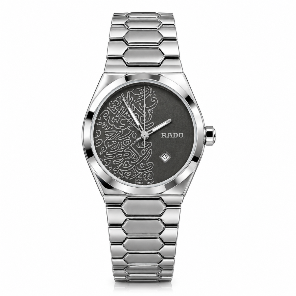 Silver-tone watch with a black art dial, silver abstract pattern, and hexagonal link stainless steel bracelet.