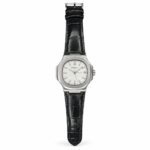 Silver cushion dress watch with white textured dial, silver indices, and black leather strap.