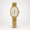 Gold oval ladies watch with white textured dial, gold indices, and expanding link bracelet.